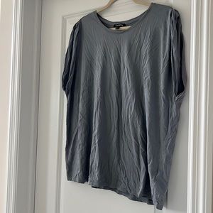 Like new. No stains. Light sky blue in color